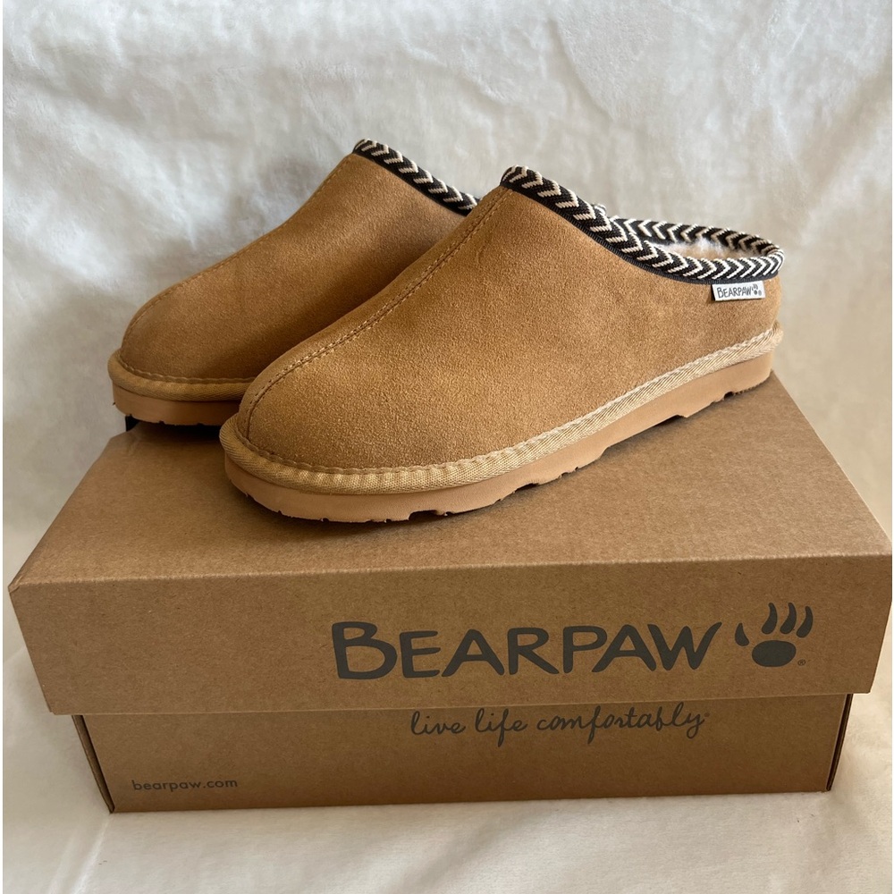 Bear paw slip on boots style name is Tabitha. Size 7 in women’s.